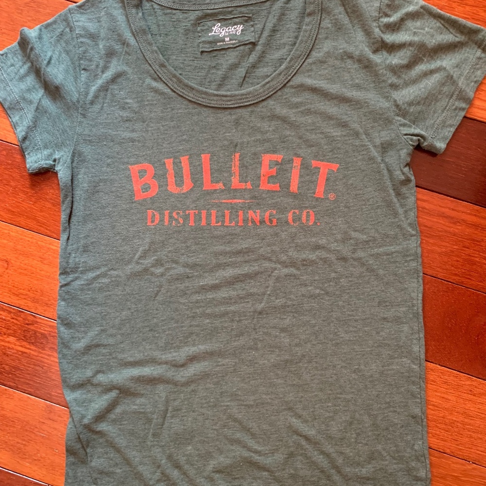 Bulleit Distilling Co women's tee in green with orange, size medium